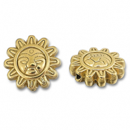 Abalorios Acero Inox flor con rostro Dorado