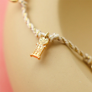 Nuevo  Descubre también nuestros colgantes metálicos DQ dorados