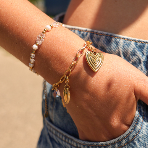 Crea divertidos collares y pulseras con colgantes de coraz&oacute;n de acero inoxidable