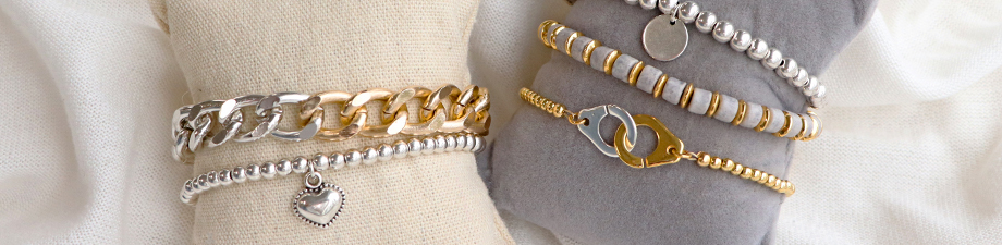 Fornituras met&aacute;licas DQ doradas